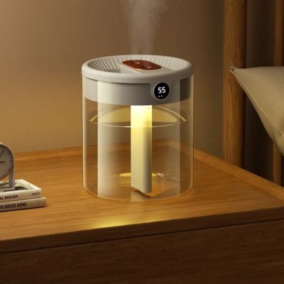 Humidificateur d air Transparent posé sur un bureau