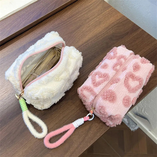 Trousse maquillage - Élégance Nori - blanc et rose claire - posées sur table - rangement innovant