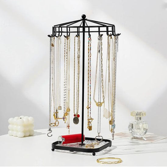 Bijoux-rangement-support-rotatif-rangement-innovant-noir-posé-sur-une-table-moderne-blanche