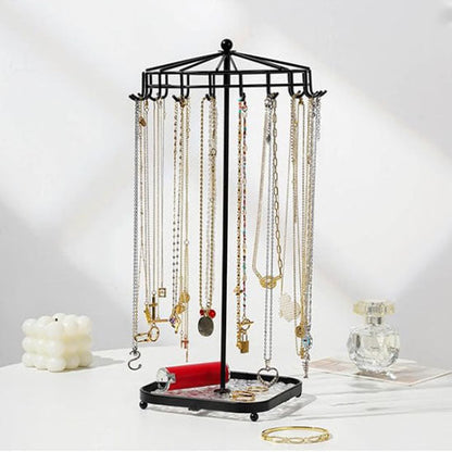 Bijoux-rangement-support-rotatif-rangement-innovant-noir-posé-sur-une-table-moderne-blanche