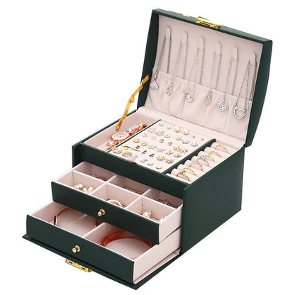 Boite-a-bijoux-prestige-rangement-innovant-vert-ouverte-remplie-de-bijoux