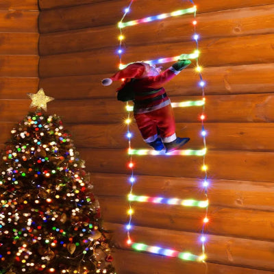Décoration noël extérieur Féerique lumière multicolore père noël escalader mur en bois