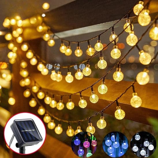 Guirlande solaire Luminéco  lumière chaude allumée décoration barrière jardin 