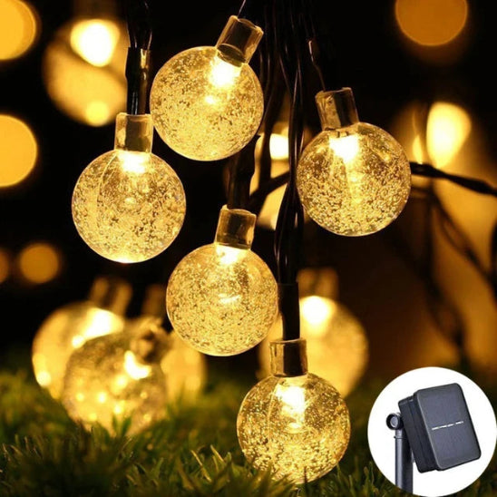 Guirlande solaire Luminéco lumière chaude allumée décoration jardin 