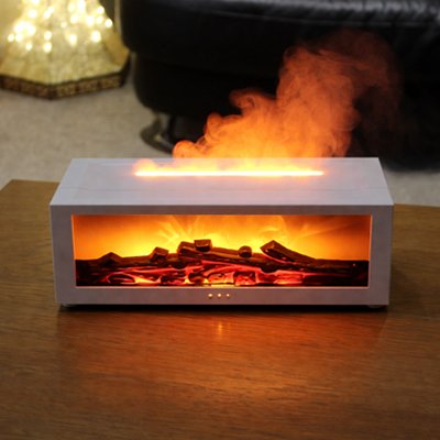 Humidificateur d'air blanc posé sur un bureau