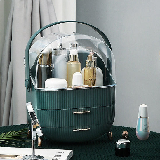 organisateur de maquillage vert devant rideau beige rangement innovant